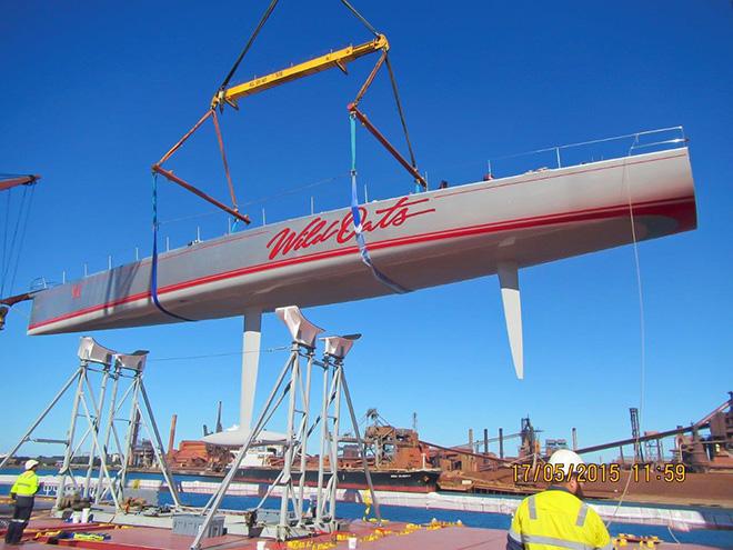 Flying high: Wild Oats XI is loaded onto aboard a special multi-purpose vessel bound for Los Angeles.  © Carlo Borlenghi / Rolex